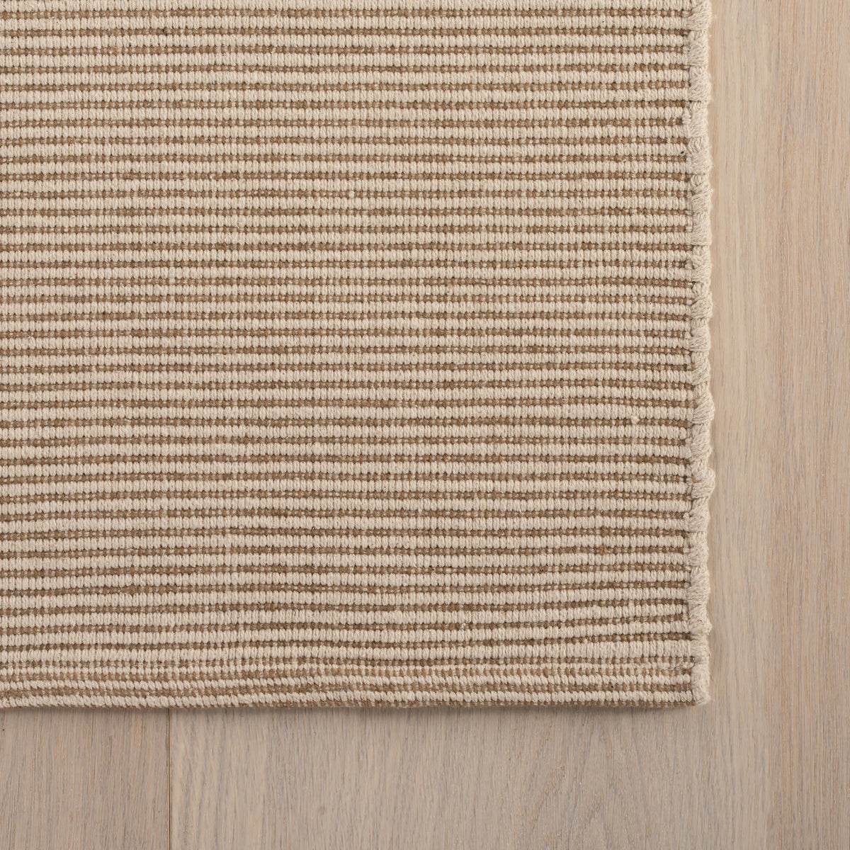Dash & Albert Haverhill Handwoven Cotton Rug in Natural, edge detail