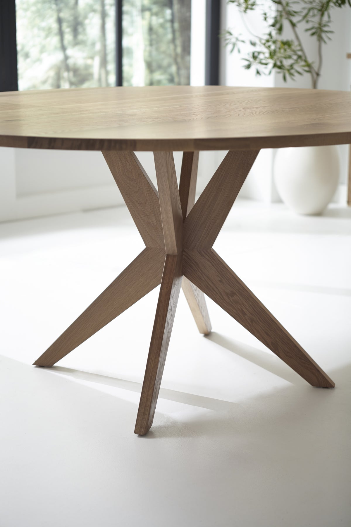 West Bros Fulton 60" Round Dining Table in 89 Sand, in a room setting