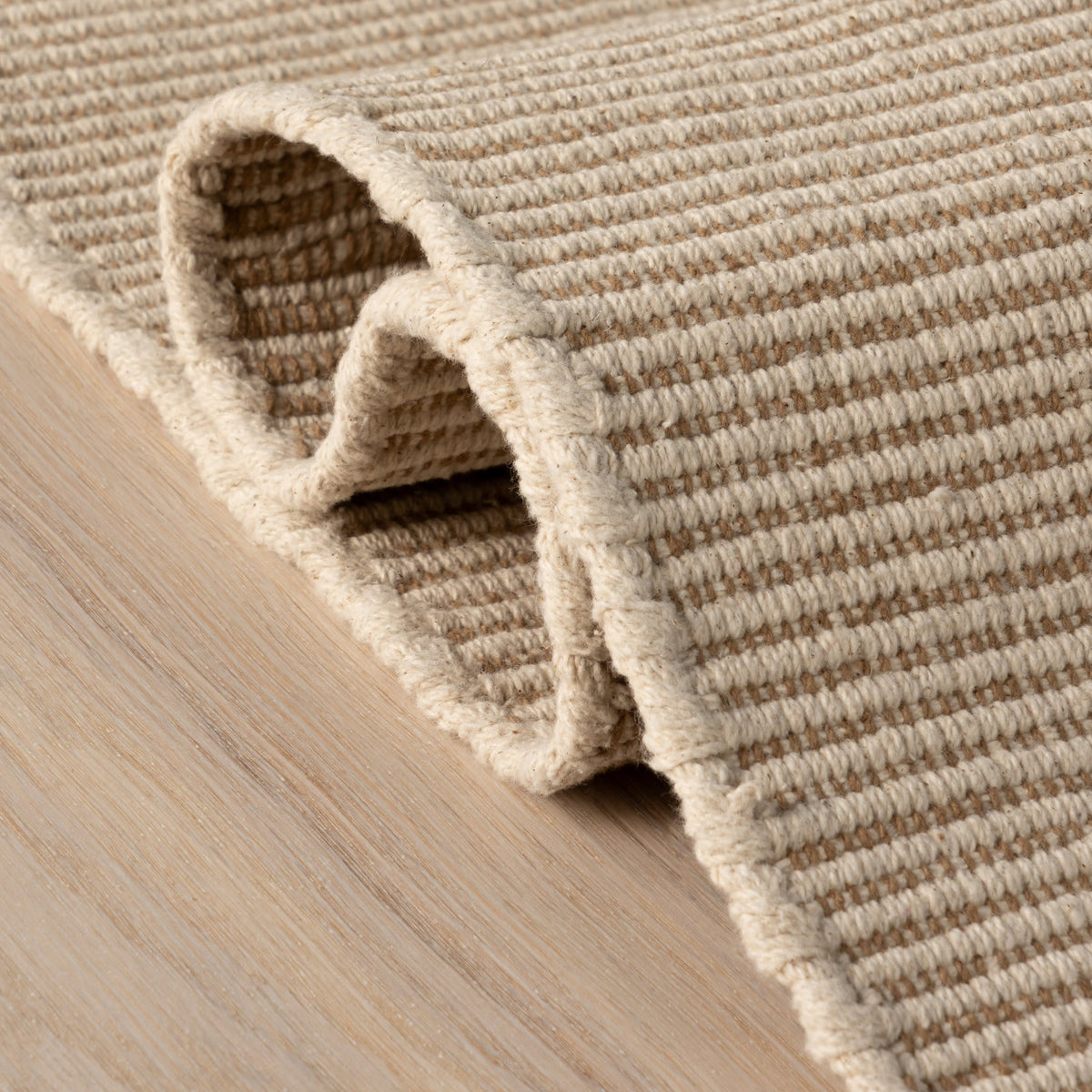 Dash & Albert Haverhill Handwoven Cotton Rug in Natural, folded