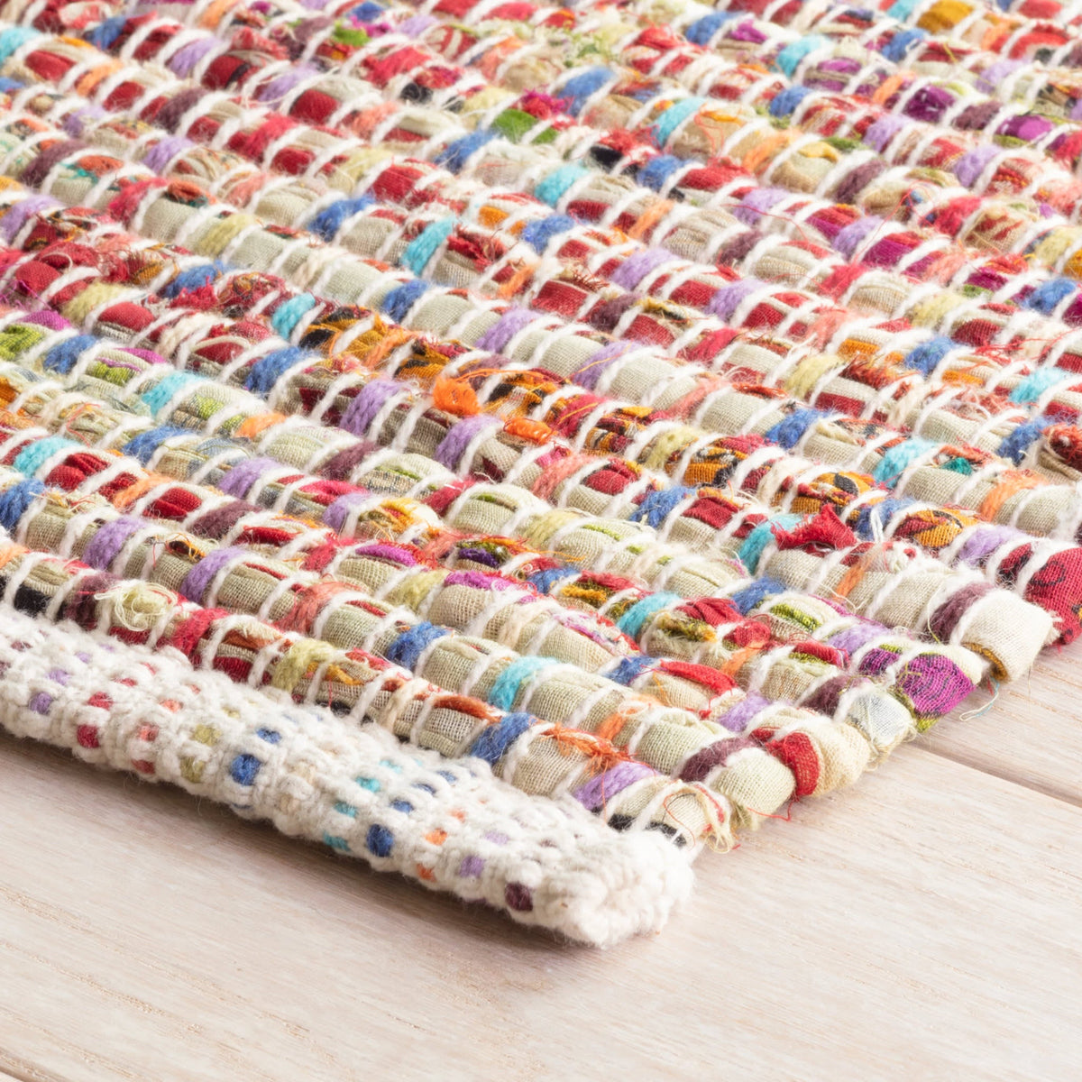 Dash & Albert Vista Chindi Handwoven Cotton Rug in Multi, corner detail