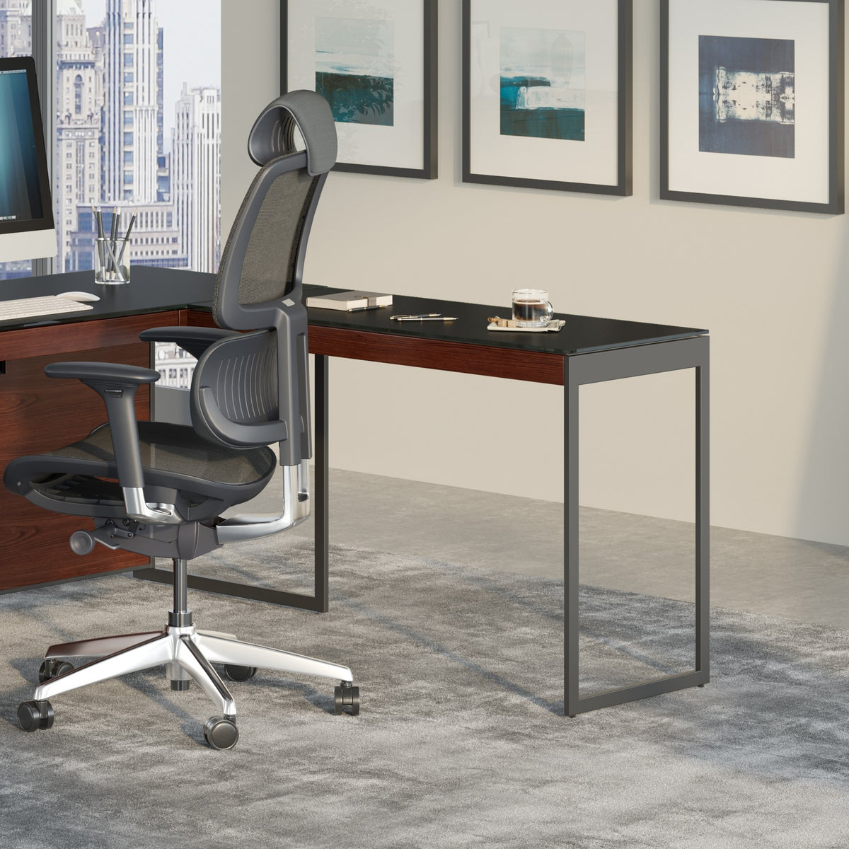 BDi Sequel 20 6112 Desk Extension in Chocolate Stained Walnut, with a black frame, joined to the desk with a mobile file, in an office