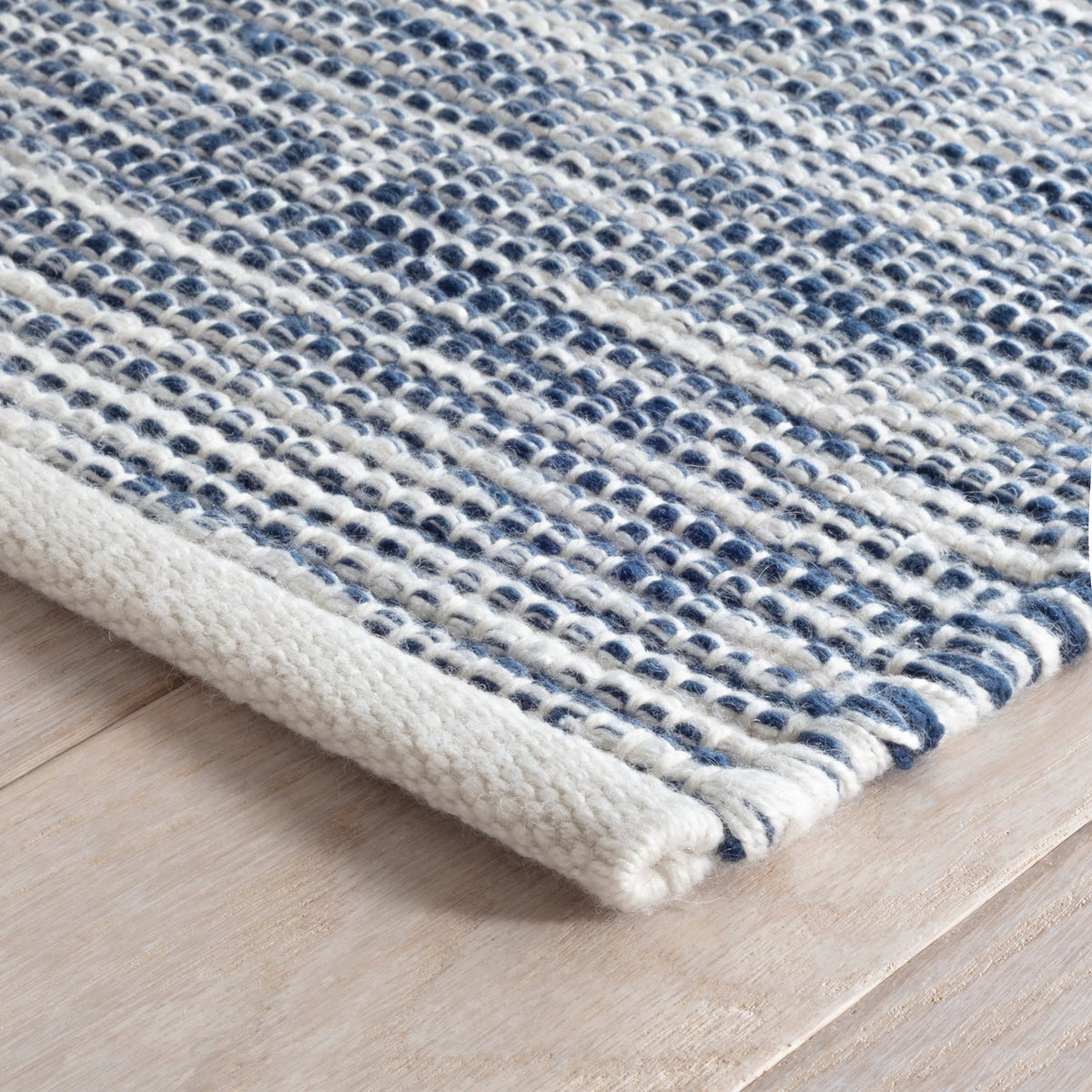 Dash & Albert Tideline Handwoven Indoor/Outdoor Rug in Navy, corner detail