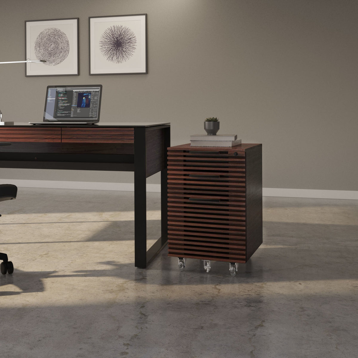 BDi Corridor 6507 Mobile File Cabinet in Chocolate Stained Walnut, beside a desk in an office