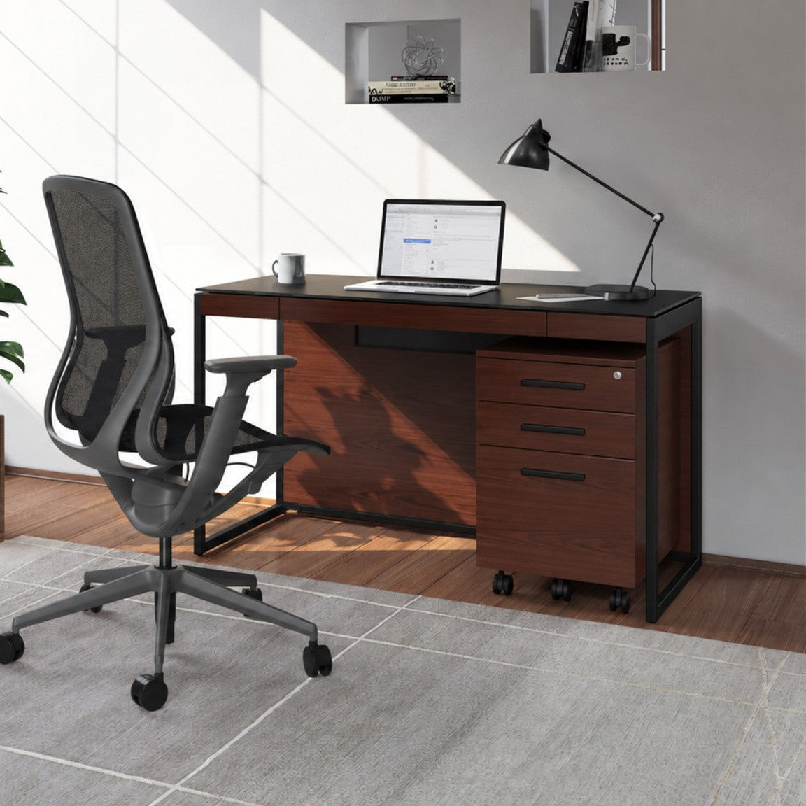 BDi Sequel 20 6107 Mobile File Cabinet in Chocolate Stained Walnut, under a compact desk, in a home office
