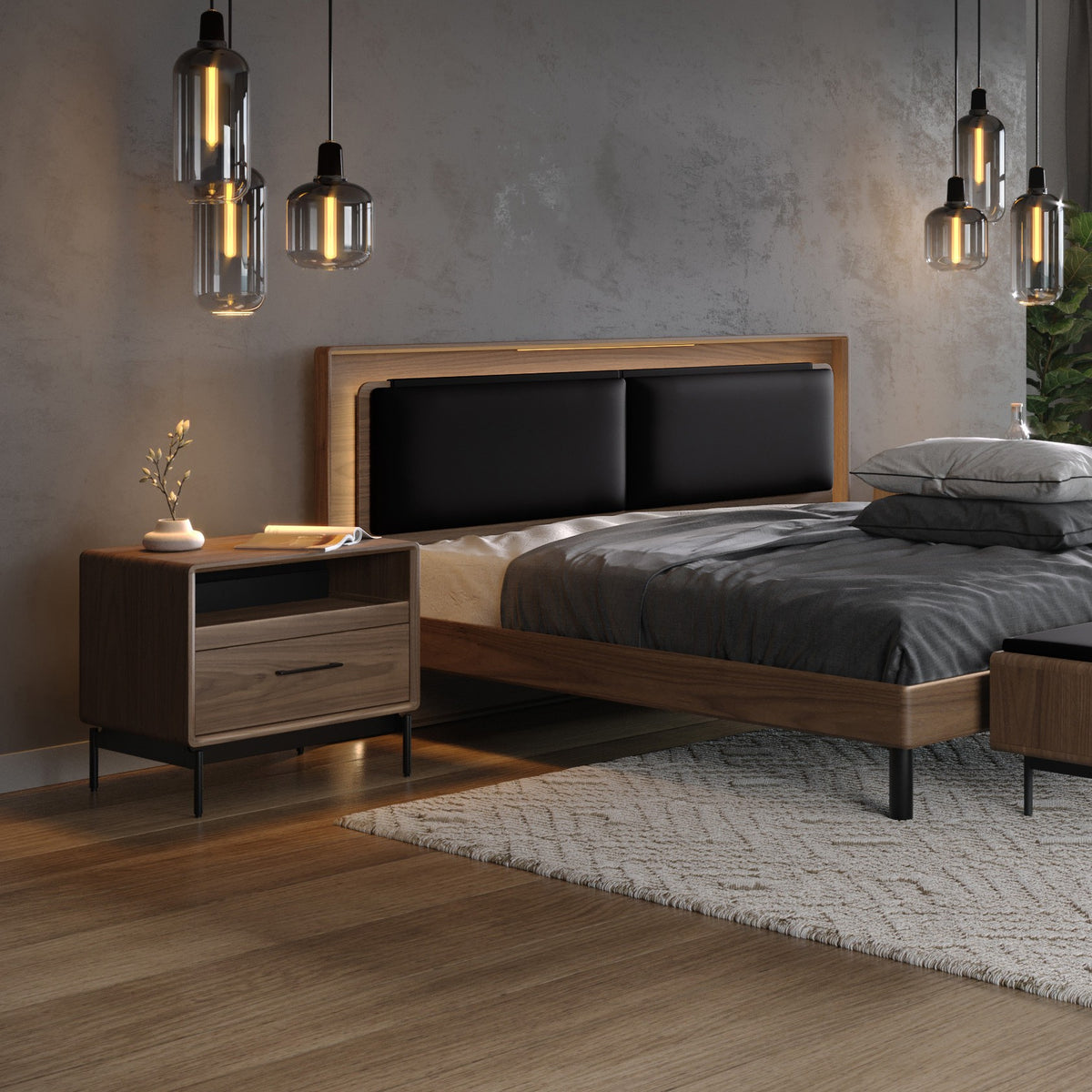 BDi Linq Nightstand in Natural Walnut, 28-inch, beside a bed with Contour cushions