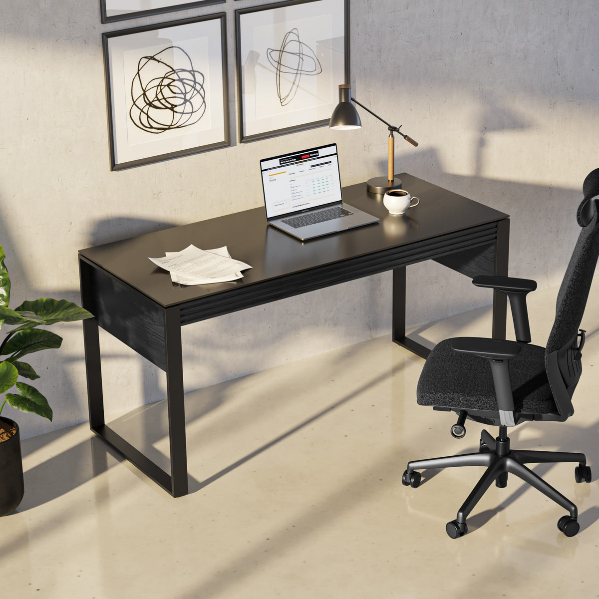 BDi Corridor 6501 Office Desk in Charcoal Stained Ash, in a sunlit home office with a desk chair