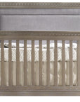 Owl Brushed Oak with Fog Fabric | Ithaca 5-in-1 Convertible Crib w/Upholstered Headboard Panel | Valley Ridge Furniture