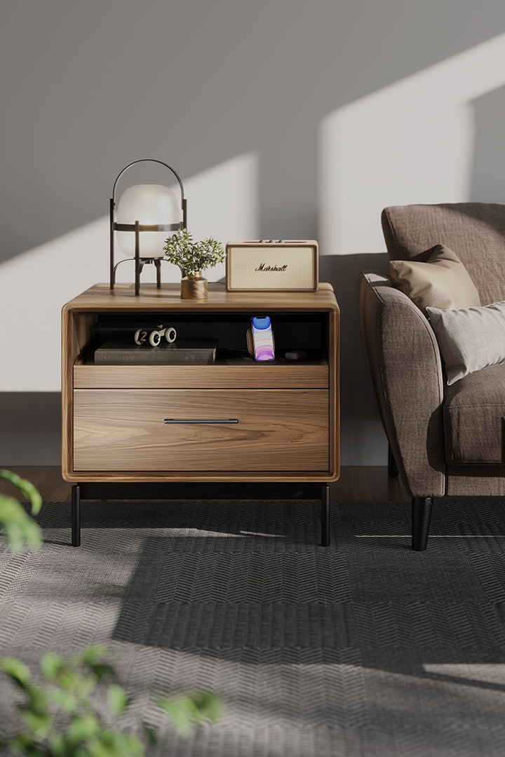 BDi Linq Nightstand in Natural Walnut, 28-inch, beside an armchair