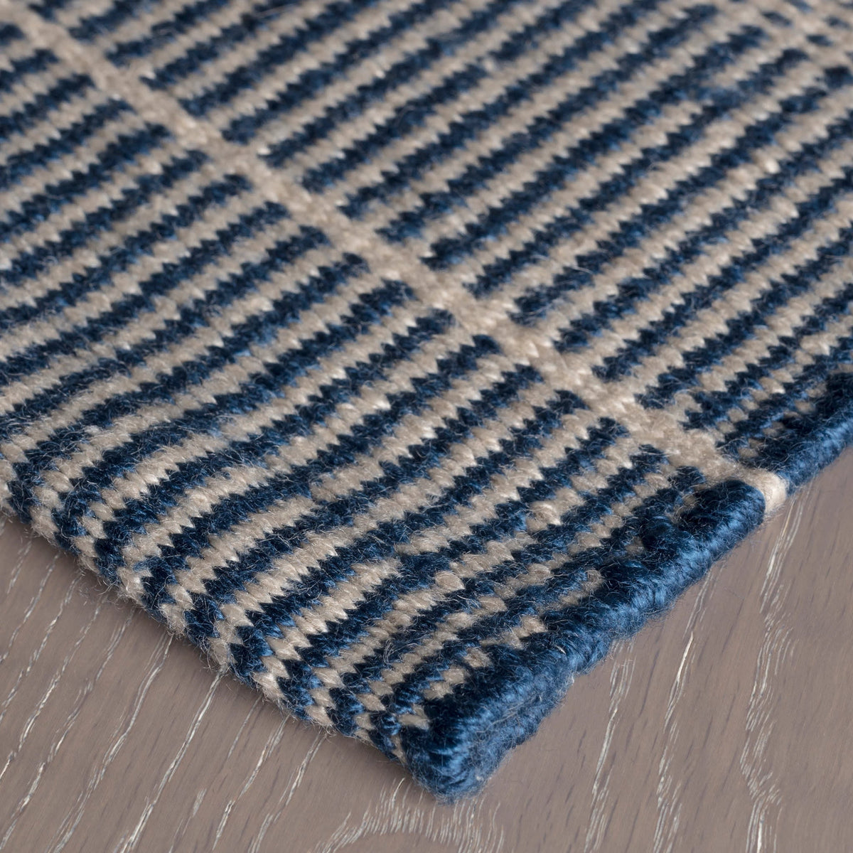 Dash & Albert Samson Handwoven Indoor/Outdoor Rug in Navy, corner detail