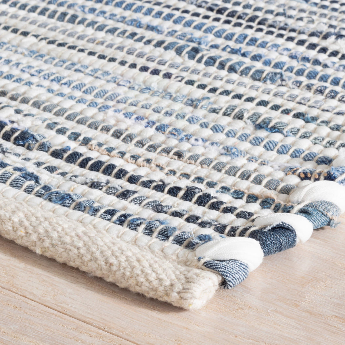 Dash & Albert Denim Rag Ribbed Handwoven Cotton Rug in Blue, corner detail