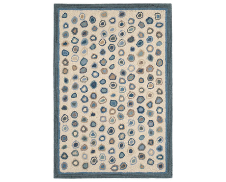 Rug with a Cat's Paw Hand Micro Hooked pattern on a plain background