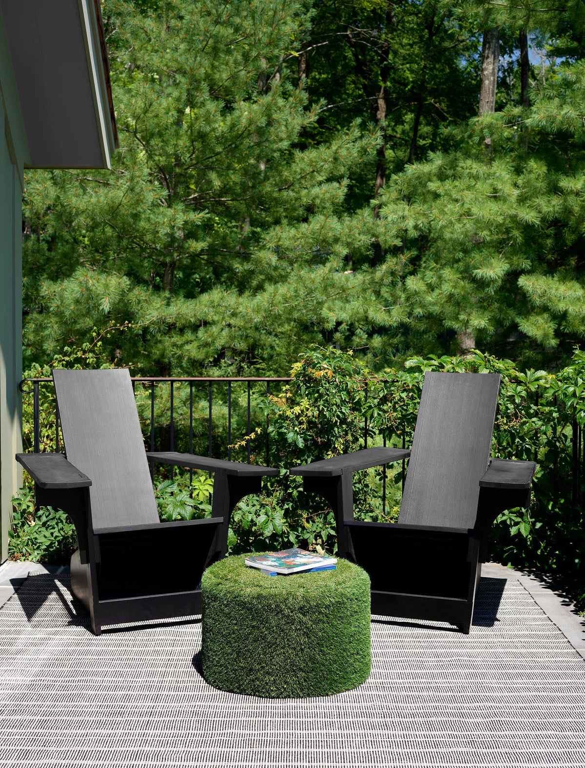 Dash & Albert Samson Handwoven Indoor/Outdoor Rug in Black, deck setting