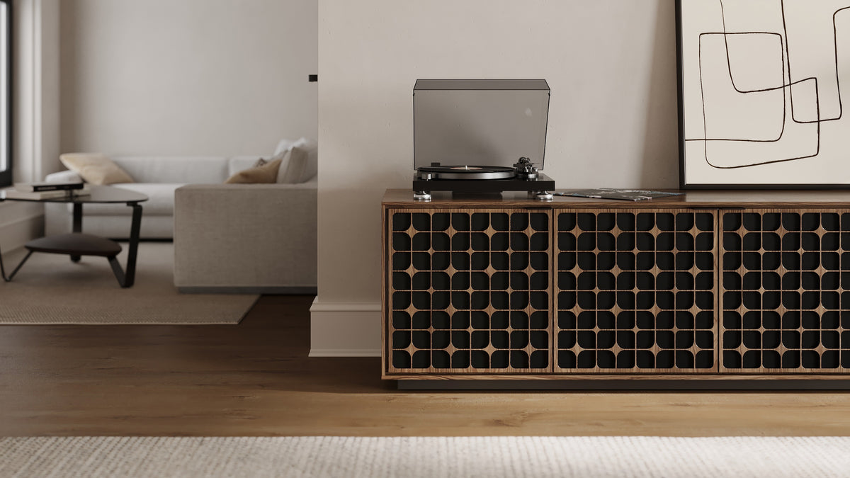 BDi Elements 8703 Media + Storage Cabinet in Natural Walnut, with a turntable, in a living room, with Constellation door fronts