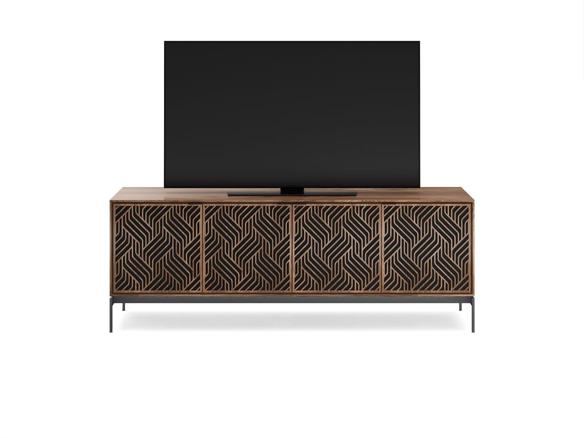 BDi Elements 8709 Media + Storage Console in Natural Walnut, front view with a TV, on white, with Weave door fronts