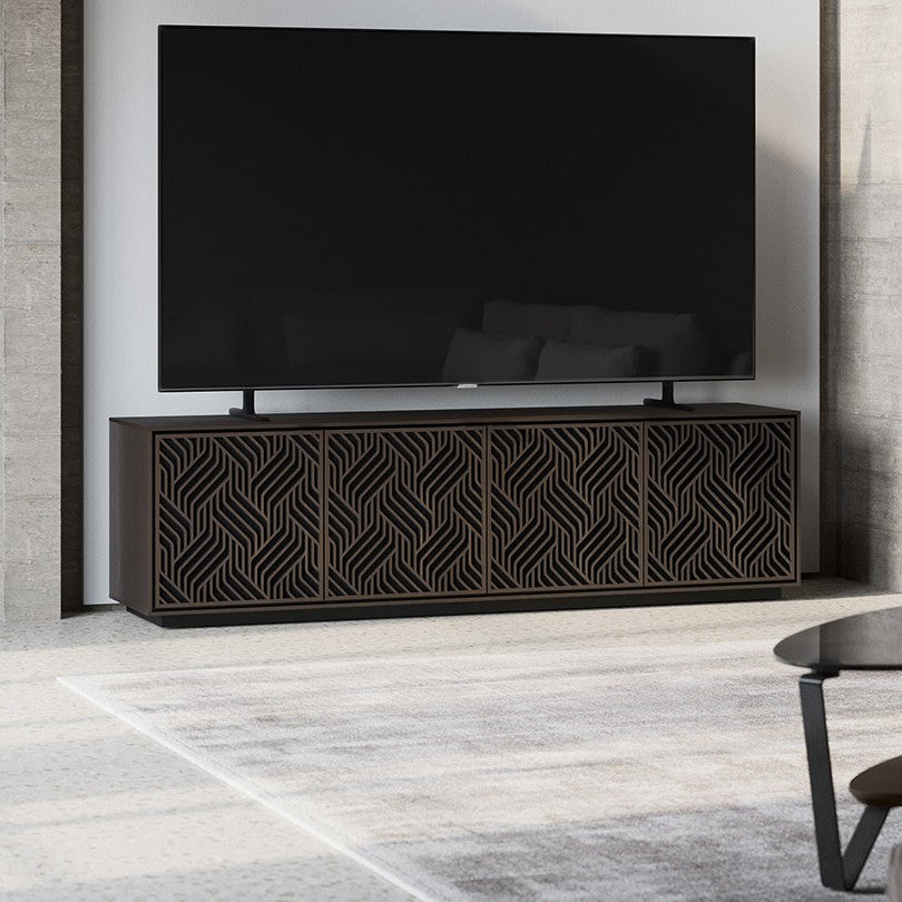 BDi Elements 8703 Media + Storage Cabinet in Toasted Oak, in a living room under a TV, with Weave door fronts