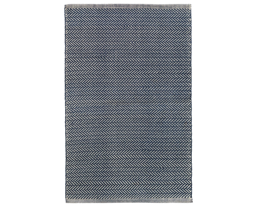 Rug with a Herringbone Handwoven pattern on a plain background