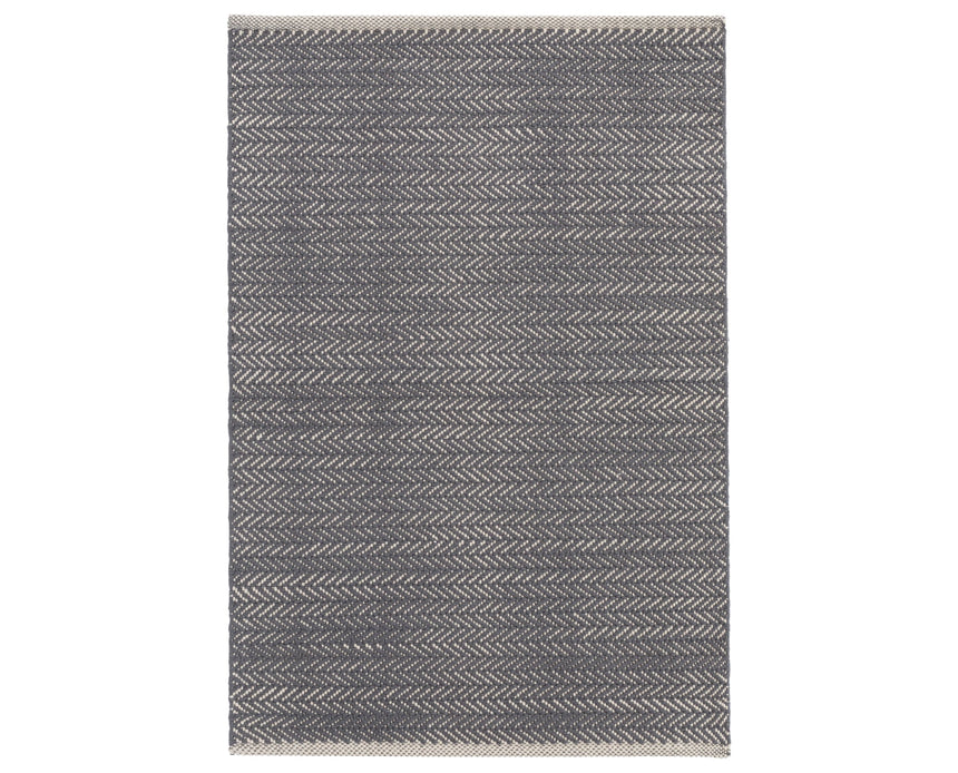 Rug with a Herringbone Handwoven pattern on a plain background