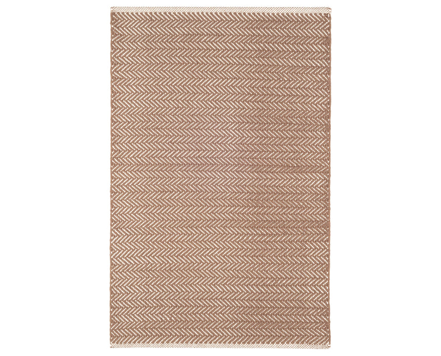 Rug with a Herringbone Handwoven pattern on a plain background