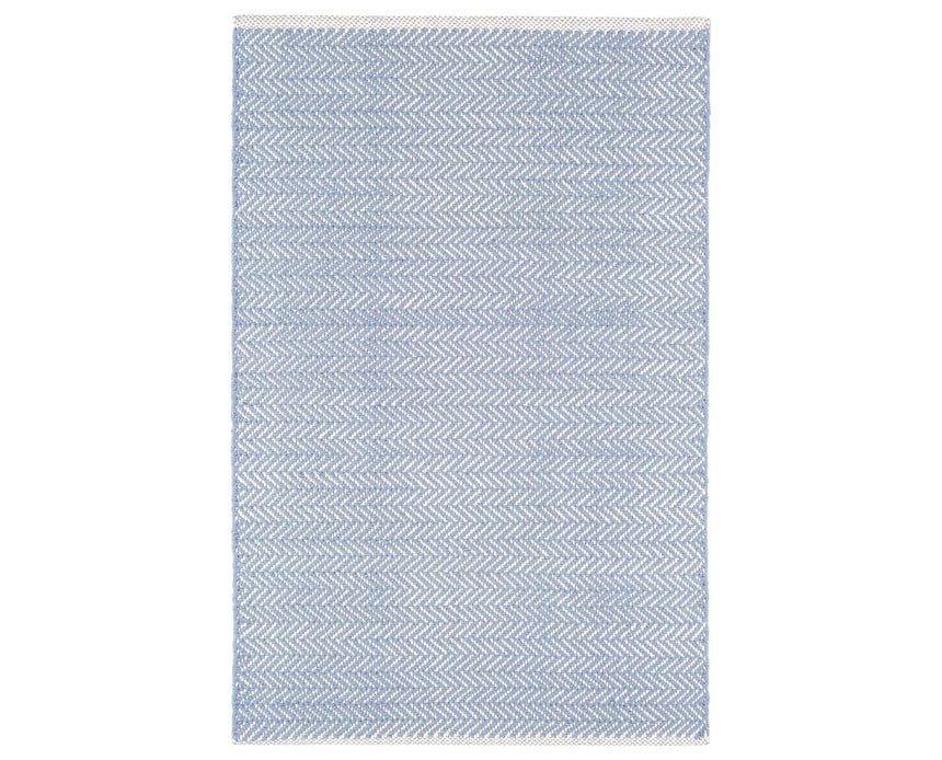 Rug with a Herringbone Handwoven pattern on a plain background