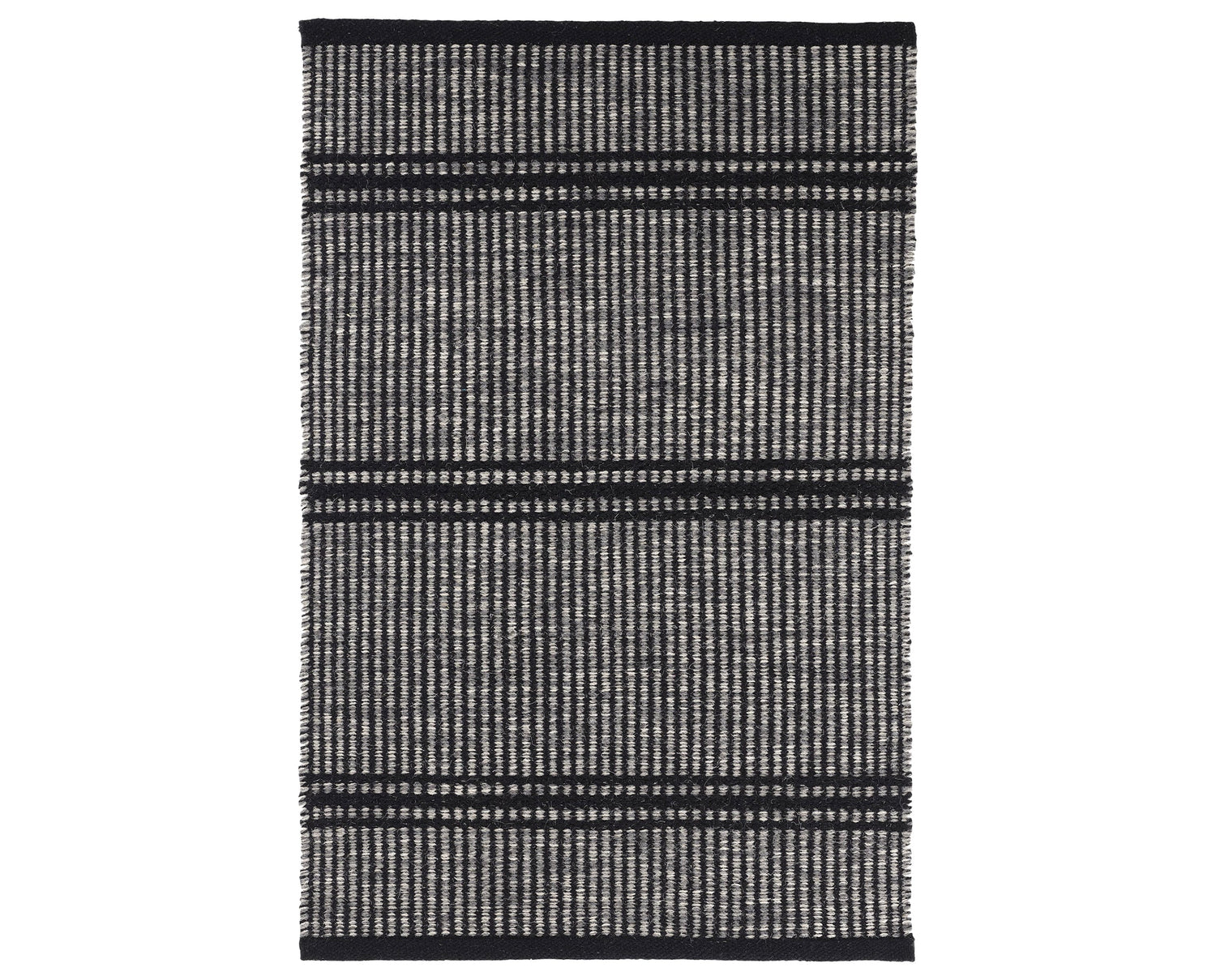 Rug with a Malta Handwoven pattern on a plain background