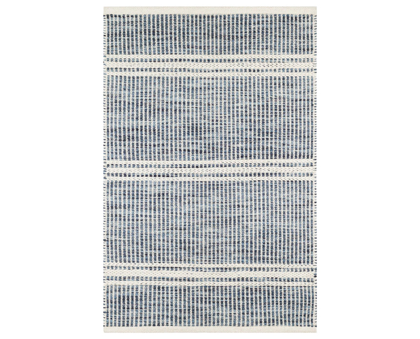 Rug with a Malta Handwoven pattern on a plain background