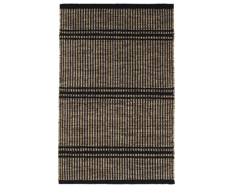 Rug with a Malta Handwoven pattern on a plain background