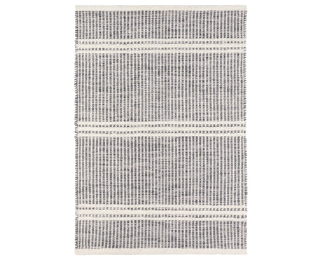 Rug with a Malta Handwoven pattern on a plain background