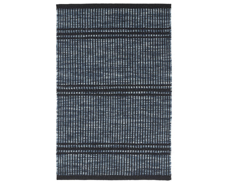 Rug with a Malta Handwoven pattern on a plain background