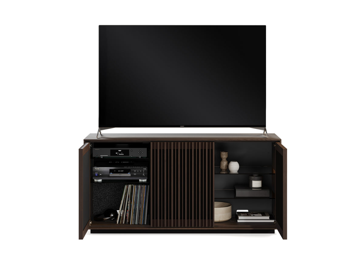 BDi Profile 8477 3-Door Media & Storage Console in Toasted Oak, outer doors open with a TV and media equipment, on white