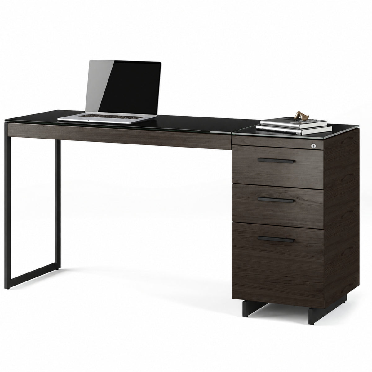 BDi Sequel 20 6112 Desk Extension in Charcoal Stained Ash, with a black frame, on a 3-drawer file cabinet, on white