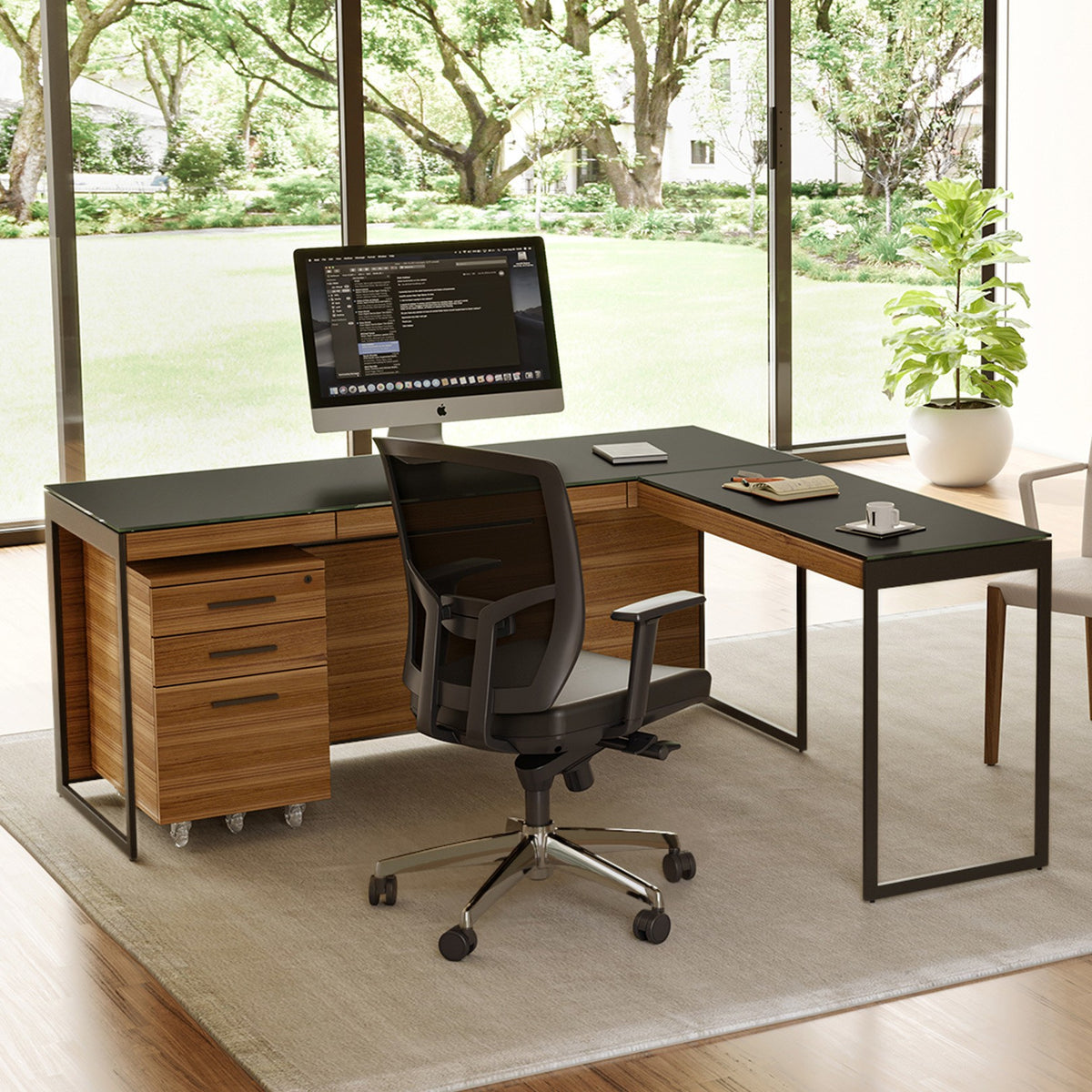 BDi Sequel 20 6107 Mobile File Cabinet in Natural Walnut, under an L-shaped desk, in a home office