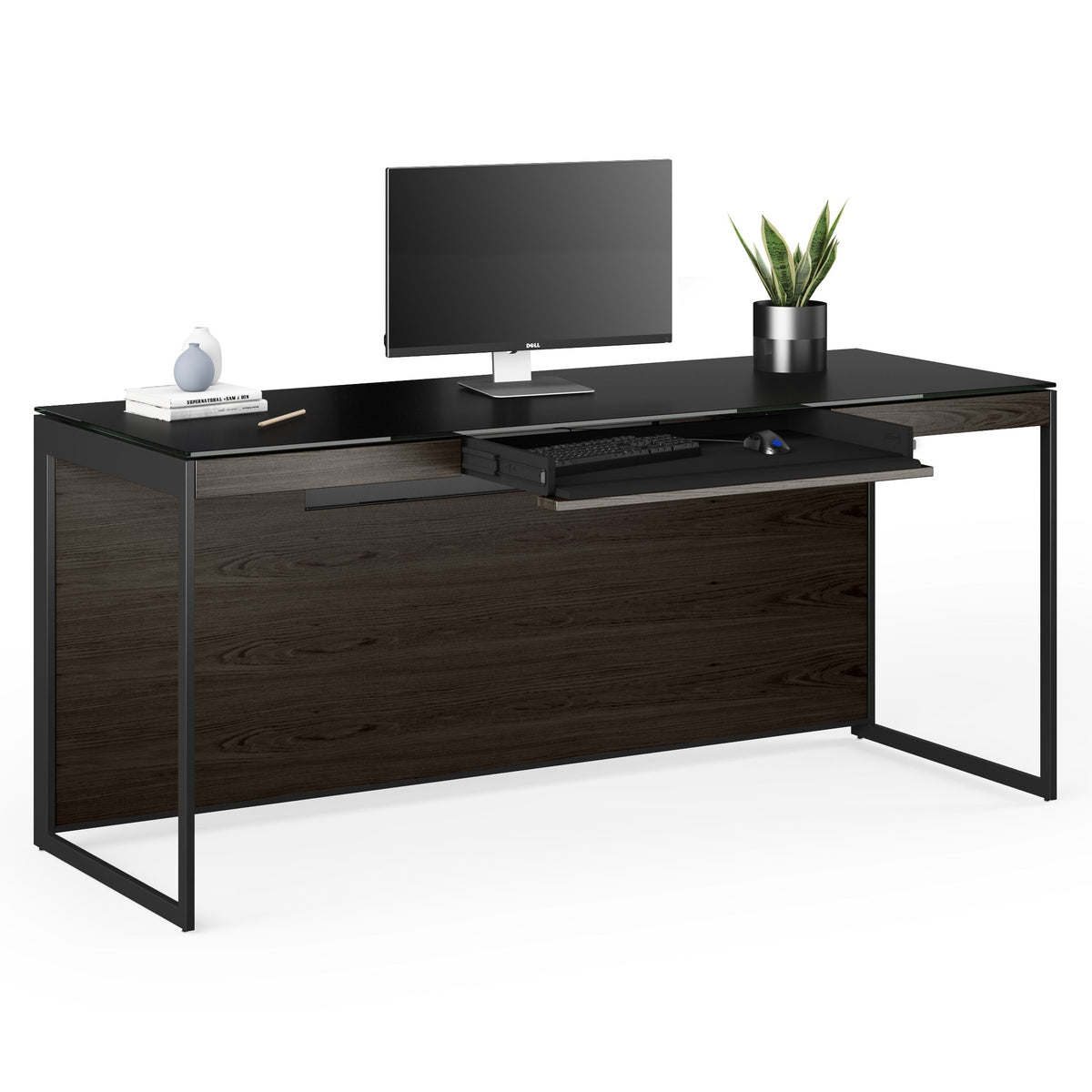 BDi Sequel 20 6101 Desk in Charcoal Stained Ash, with a black frame, keyboard drawer open, with a monitor, on white