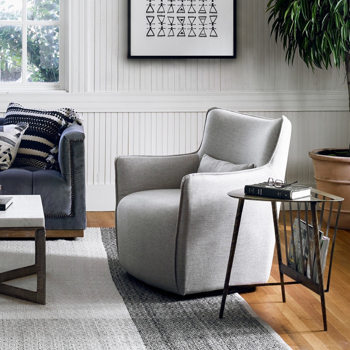 Four Hands swivel accent chair in a living room