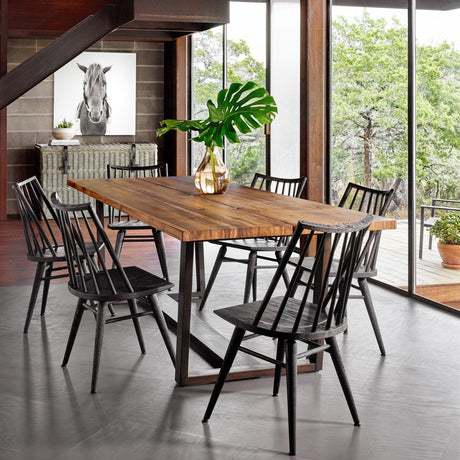 Four Hands dining chairs around a wood dining table
