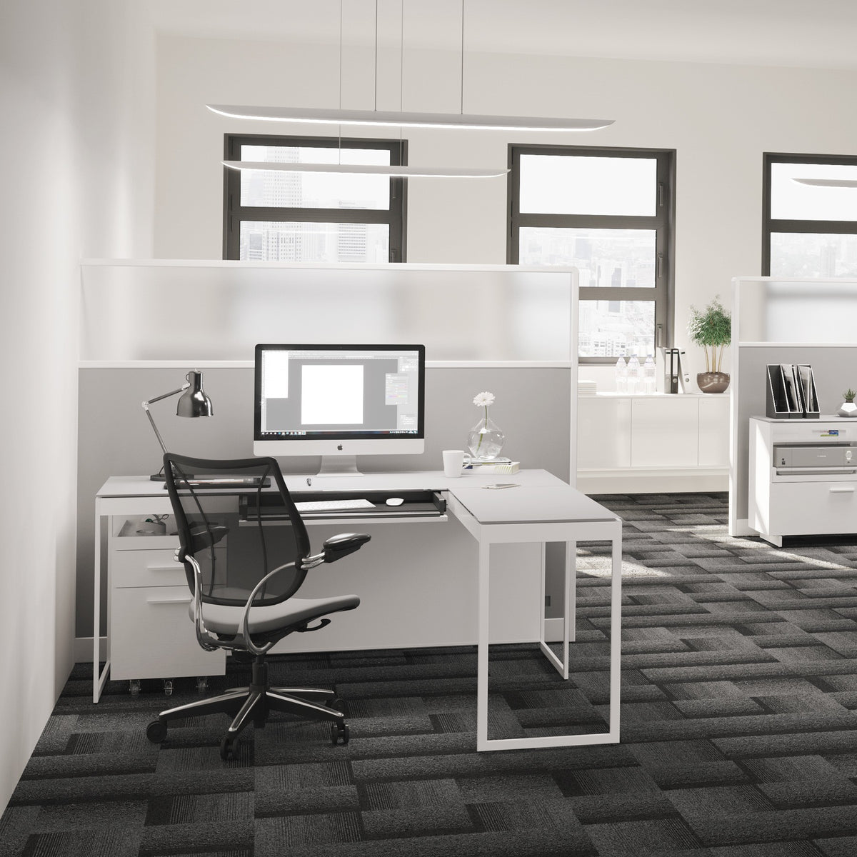 BDi Centro 6401 Desk in Satin White on Oak with Grey Glass, with a return, in an open office