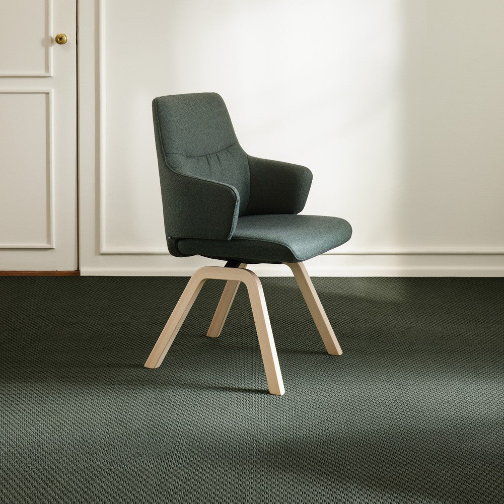 Stressless Mint Low Back Dining Chair with Vertical Legs (D100), room setting, shown in Calido Emerald Green, D200 all-groups