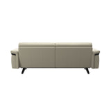 Stressless Stella Wood 2.5-Seater Sofa in Paloma Light Grey, rear three-quarter view, Black wood