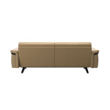 Stressless Stella Wood 2.5-Seater Sofa in Paloma Sand, rear three-quarter view, Black wood