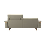 Stressless Stella Wood 2.5-Seater Sofa with Headrest in Paloma Light Grey, rear three-quarter view, Oak wood