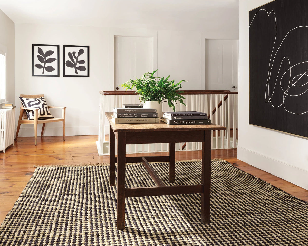 Dash & Albert Kuba Handwoven Jute Rug in Black, dining room setting