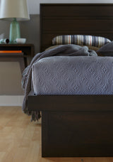 West Bros Serra Bedside Chest, top and drawer detail, Slate lacquer fronts