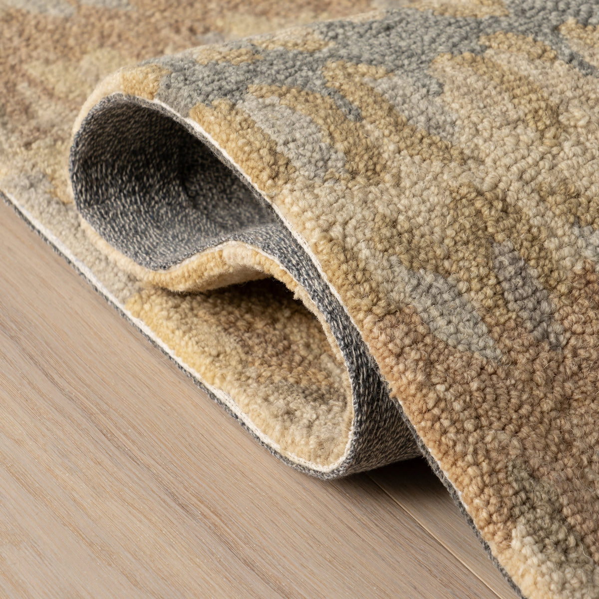 Dash & Albert Paint Chip Hand Micro Hooked Wool Rug in Natural, folded