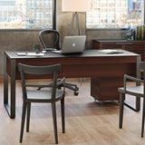 BDi Corridor 6521 Executive Office Desk in Chocolate Stained Walnut, seen from the guest side with two chairs, a credenza behind