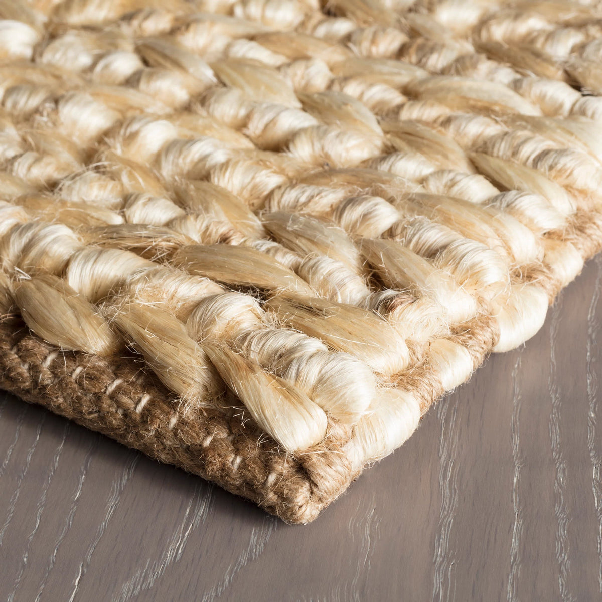 Dash & Albert Jute Handwoven Rug in Natural, corner detail