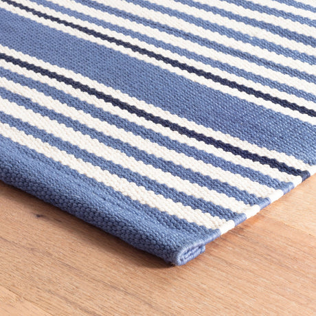Dash & Albert Rugby Stripe Handwoven Indoor/Outdoor Rug in Denim, corner detail