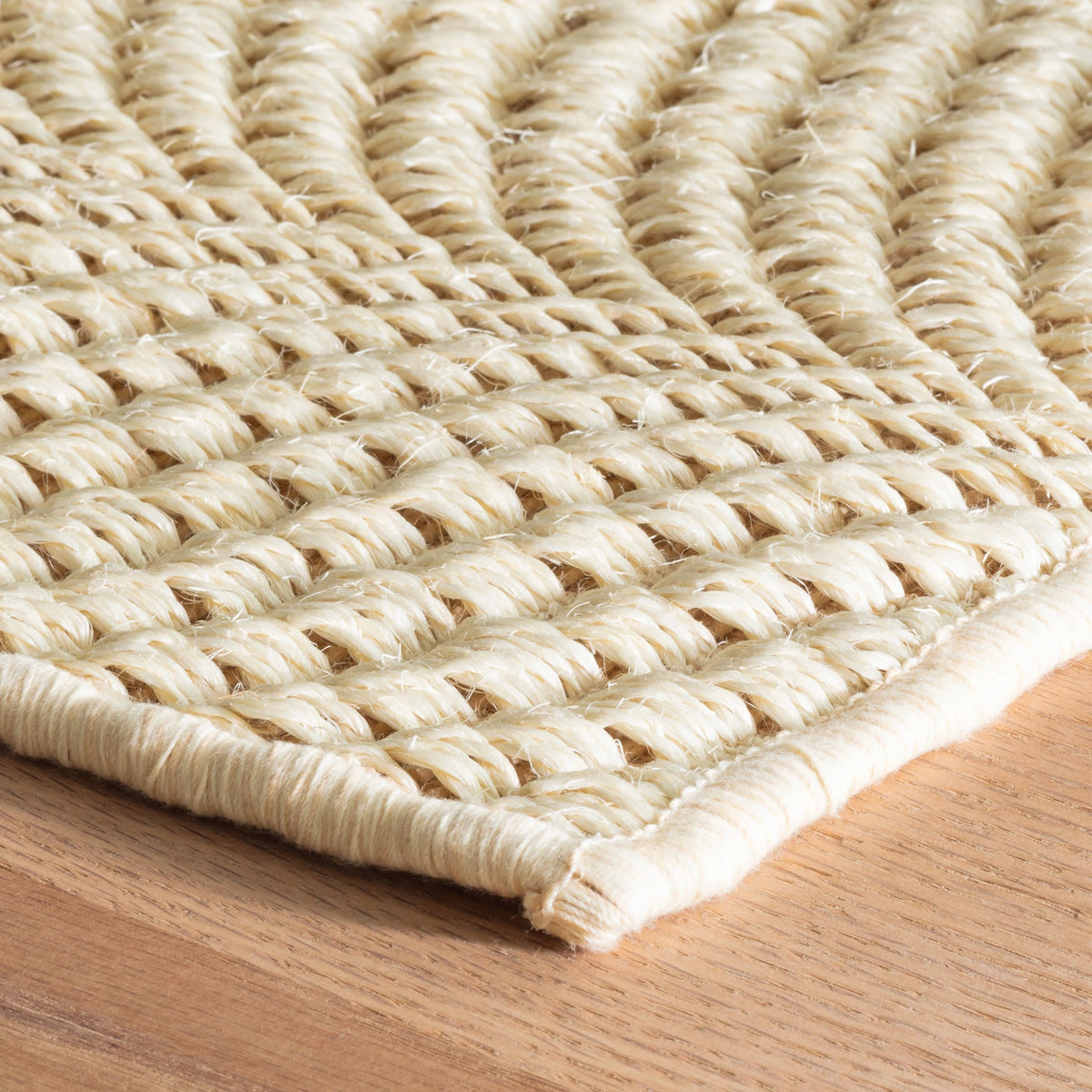 Dash & Albert Wave Woven Sisal Rug in Sand, corner detail