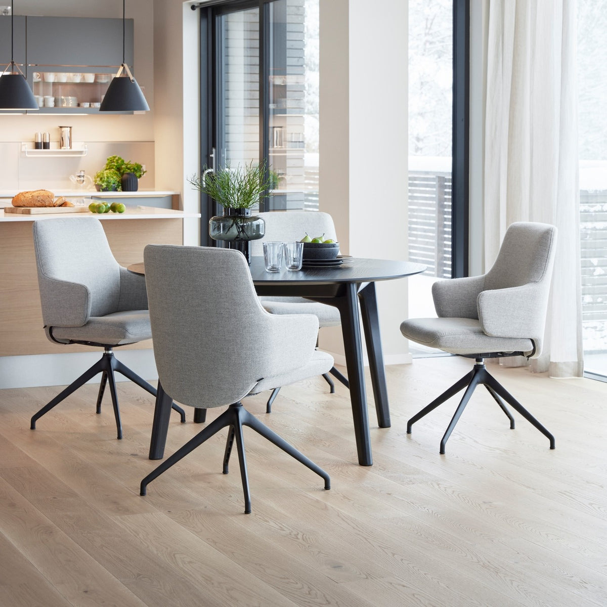 Stressless Laurel Low Back Dining Chair with Swivel Base (D350), room setting, shown in Clover Light Grey