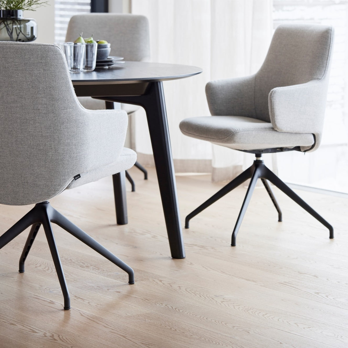 Stressless Laurel Low Back Dining Chair with Swivel Base (D350), room setting, shown in Clover Light Grey