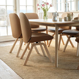 Stressless Bay Low Back Dining Chair with Vertical Legs (D100), room setting, shown in Batick New Caramel, D200 all-groups