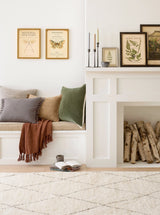 Dash & Albert Numa Hand Knotted Wool Rug in Charcoal, window seat setting